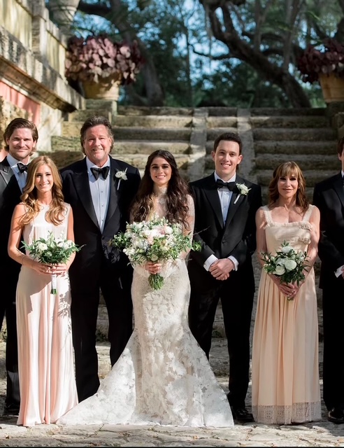 Bridal party portrait on garden steps