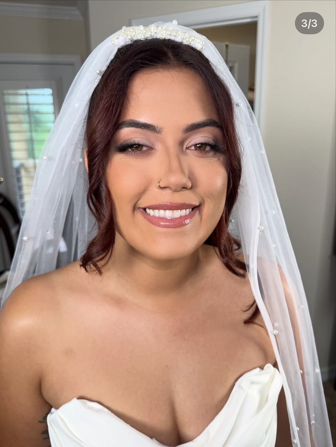 Bride in pearl veil with luminous mauve eye